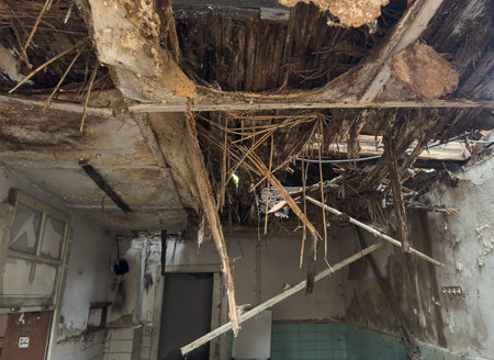 old abandoned house with a collapsed roof