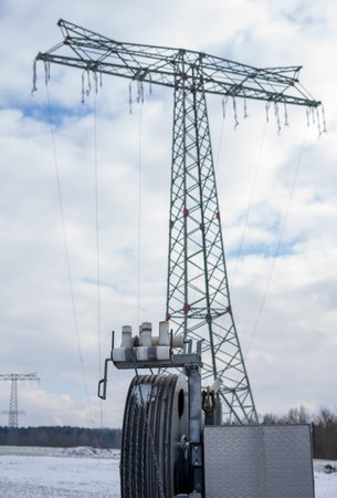 New construction of a power pylon with a winch for the power cableの写真素材