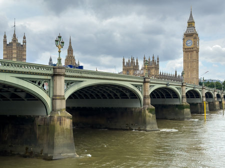 Big Ben and Houses of Parliament with Thames River in London, UK