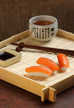 Modestly served little table, in traditional Japanese style...の写真素材
