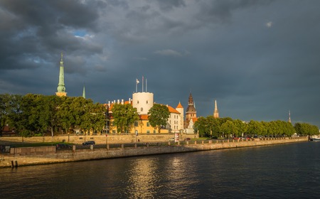 Fantastic view of the Riga Castle from the riverside in a summer eveningのeditorial素材