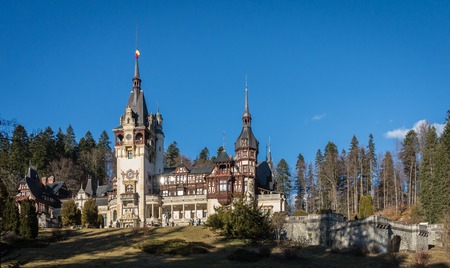 Pele? Castle near Sinaia and the Carpathian Mountains in a sunny day. Transylvania, Romaniaのeditorial素材