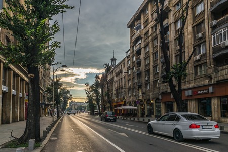 BUCHAREST, ROMANIA - 07.20.2018. Old Center of Bucharest, Romania in a cloudy summer morning. Sullen and unpleasant atmosphere, dirty streets and shabby buildings.のeditorial素材