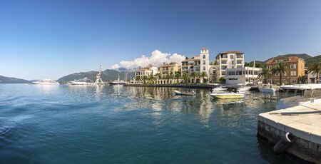 Tivat, Montenegro - 07.11.2018. Embankment of Tivat city, Montenegro, in a sunny summer day. The beginning of the cruise on the Bay of Kotor.のeditorial素材