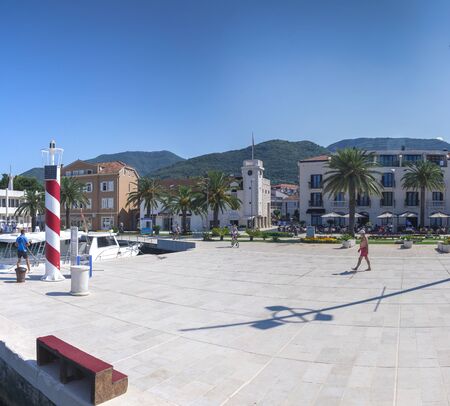 Tivat, Montenegro - 07.11.2018. Embankment of Tivat city, Montenegro, in a sunny summer day. The beginning of the cruise on the Bay of Kotor.のeditorial素材