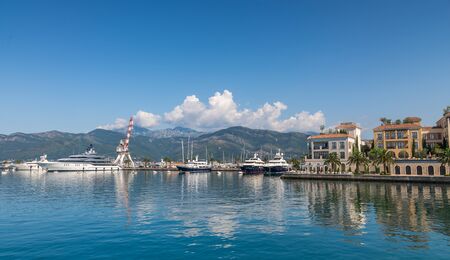 Tivat, Montenegro - 07.11.2018. Embankment of Tivat city, Montenegro, in a sunny summer day. The beginning of the cruise on the Bay of Kotor.のeditorial素材