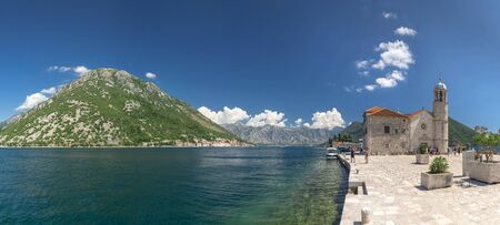 Perast, Montenegro - 07.11.2018.  Our Lady of the Rocks church on an Island in the Bay of Kotor, Montenegro,  in a sunny summer dayのeditorial素材