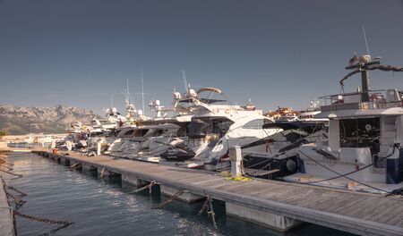 Budva, Montenegro - 07.10.2018.  Boats and Yachts in the Dukley Marina on a sunny summer dayのeditorial素材