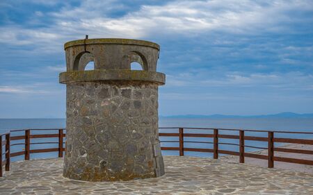 Nessebar, Bulgaria â 07.09.2019. Old tower on the promenade of Nessebar ancient city, Bulgaria, on a cloudy summer morningのeditorial素材