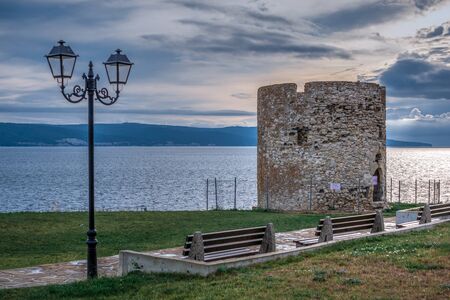 Nessebar, Bulgaria â 07.10.2019. Old Windmill on the promenade of Nessebar, Bulgaria, on a cloudy summer eveningのeditorial素材