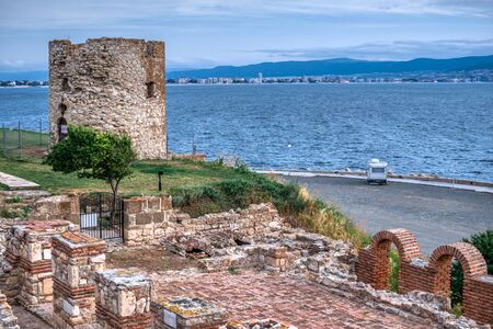 Nessebar, Bulgaria â 07.10.2019. Old Windmill on the promenade of Nessebar, Bulgaria, on a cloudy summer eveningのeditorial素材