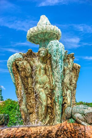 Ravadinovo, Bulgaria â 07.11.2019.  Fountain in the square near the church on the territory of the Ravadinovo castle in Bulgaria, on a sunny summer dayのeditorial素材