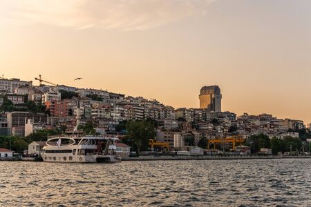 Istambul, Turkey â 07.12.2019. Panoramic view from the sea to the right bank of the Bosphorus at sunsetのeditorial素材