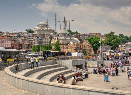 Istambul, Turkey â 07.13.2019. Many people on the Eminonu Embankment near the Galata bridge in Istanbul, on a sunny summer dayのeditorial素材