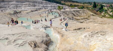 Pamukkale, Turkey â 07.15.2019. White limestone mineral fields in Pamukkale, Turkey, on a sunny summer day.のeditorial素材