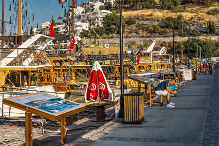 Kusadasi, Turkey  07.18.2019. Pleasure boat parking near Kusadasi castle in Turkey on a summer eveningのeditorial素材