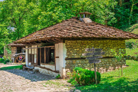 Old traditional house in the Etar Architectural Ethnographic Complex in Bulgaria on a sunny summer dayのeditorial素材