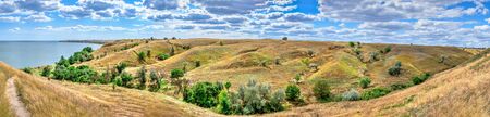 Ancient greek colony Olbia on the banks of the Southern Bug River in Ukraine on a cloudy summer day. Hi-res panoramic photo.の写真素材