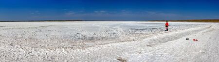White Salty drying lake under the blue sky in Rybakovka, Odessa region, Ukraine. Big size panoramic photoの写真素材