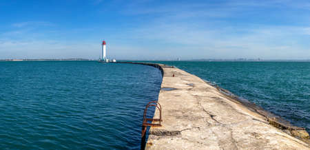Lighthouse at the entrance to the harbor of Odessa seaport, on a sunny summer dayのeditorial素材