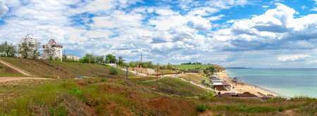 Yuzhne, Ukraine 05.23.2020. Seaside park and Public beach in the city of Yuzhne, Ukraine. Panoramic view on a sunny spring dayのeditorial素材