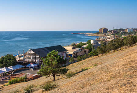 Chernomorsk, Ukraine 08.22.2020. Panoramic view of the Public beach in Chernomorsk city on a sunny summer morningのeditorial素材