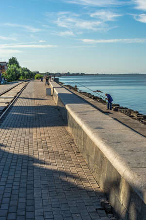 Berdyansk, Ukraine 07.23.2020. Embankment of the Azov Sea in Berdyansk, Ukraine, on a sunny summer morningのeditorial素材