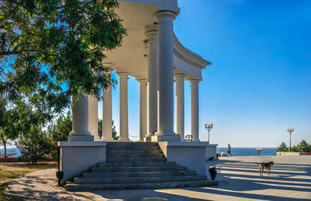 Chernomorsk, Ukraine 08.22.2020. Colonnade and Obelisk of Glory in Chernomorsk city on a sunny...