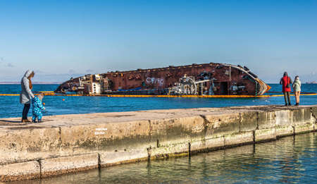 Odessa, Ukraine 12.04.2019. The wreck of a small tanker `DELFI` off the coast of Odessa on a sunny...