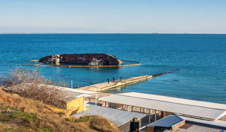 Odessa, Ukraine 12.04.2019. The wreck of a small tanker `DELFI` off the coast of Odessa on a sunny...