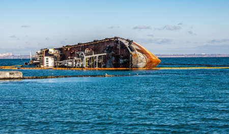 Odessa, Ukraine 12.04.2019. The wreck of a small tanker `DELFI` off the coast of Odessa on a sunny winter dayのeditorial素材