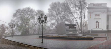 Odessa, Ukraine 11.28.2019. Monument to the cannon on Primorsky Boulevard in Odessa, Ukraine, on a foggy autumn dayのeditorial素材