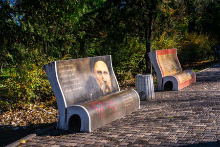 Odessa, Ukraine 11.05.2019. Artistically designed street benches in Shevchenko Park in Odessa, Ukraine, on a sunny autumn dayのeditorial素材
