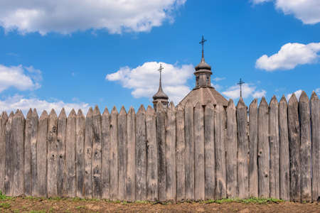 Zaporozhye, Ukraine 07.20.2020. External walls, wooden fence and watchtowers of the National Reserve Khortytsia in Zaporozhye, Ukraine, on a sunny summer dayのeditorial素材