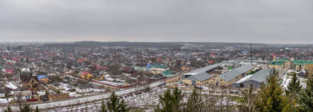 Pochaev, Ukraine 04/01/2020. Panoramic top view of the Pochaev village from the terrace of Holy Dormition Lavra in Ukraine, on a gloomy winter morningのeditorial素材