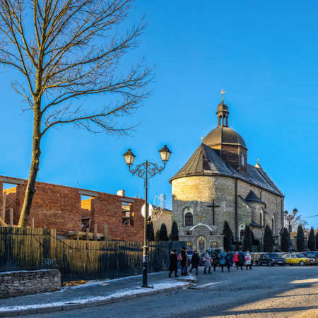 Kamianets-Podilskyi, Ukraine 07/01/2020. Trinity Church in Kamianets-Podilskyi historical center on a sunny christmas winter morningのeditorial素材