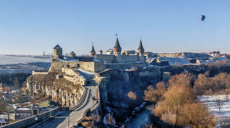Kamianets-Podilskyi, Ukraine 07/01/2020. Panoramic view of the Kamianets-Podilskyi fortress on a sunny winter morningのeditorial素材