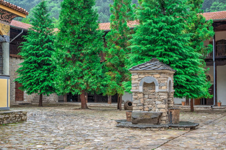 Asenovgrad, Bulgaria 07/24/2019. Bachkovo Monastery of the Dormition of the Theotokos or Assumption of holy virgin in southern Bulgaria, on a cloudy summer dayのeditorial素材