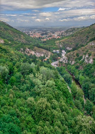 Asenovgrad, Bulgaria 07/24/2019. Bulgarian Rhodope mountain view from the side of the Asens Fortress on a cloudy summer dayのeditorial素材