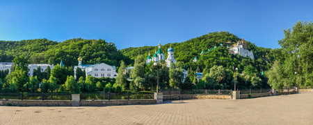 Svyatogorsk, Ukraine 07.16.2020. Embankment near the Seversky Donets River opposite the Svyatogorsk Lavra on a sunny summer morningのeditorial素材