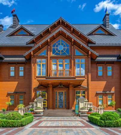 Kyiv, Ukraine 07.10. Honka or the main wooden house in the Mezhyhirya Residence, Kyiv, Ukraine, on a sunny summer dayのeditorial素材
