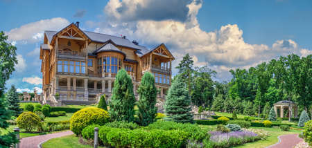 Kyiv, Ukraine 07.10. Honka or the main wooden house in the Mezhyhirya Residence, Kyiv, Ukraine, on a sunny summer dayのeditorial素材