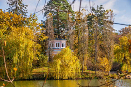 Upper Pond and Anti Circe Island in the Sofievsky arboretum or Sofiyivsky Park in Uman, Ukraine, on a sunny autumn dayの写真素材