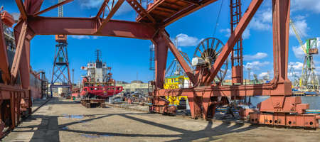 Chernomorsk, Ukraine. 03/21/2021. Big ship at the pier in the Chernomorsk Shipyard on a sunny spring...