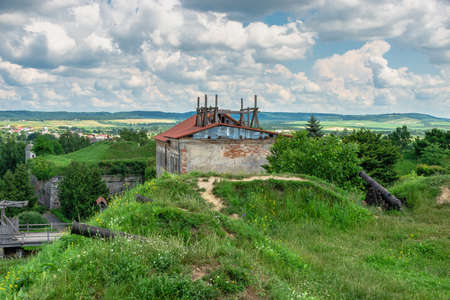 Zolochiv, Ukraine 06.07.2021. Solid walls of ther Zolochiv Castle, Galicia region of Ukraine, on a...
