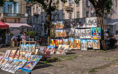 Lviv, Ukraine 07.07.2021. Art market near the Lviv State Academic Theater of Opera and Ballet on a sunny summer dayのeditorial素材