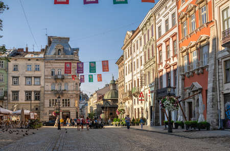 Lviv, Ukraine 07.07.2021. Market or Rynok square in the old town of Lviv, Ukraine, on a sunny summer morningのeditorial素材