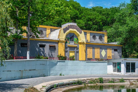 Odessa, Ukraine 06/28/2022 Abandoned building near the artificial lake in the Dyukovsky park of Odessa, Ukraine, on a sunny summer dayのeditorial素材