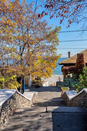 Odessa, Ukraine 28.10.2022. Sunny autumn day on the Embankment of Lanzheron beach in Odessa, Ukraine
