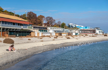 Odessa, Ukraine 28.10.2022. The coast of the Black Sea on Lanzheron beach in Odessa, Ukraine, on a sunny autumn dayの写真素材